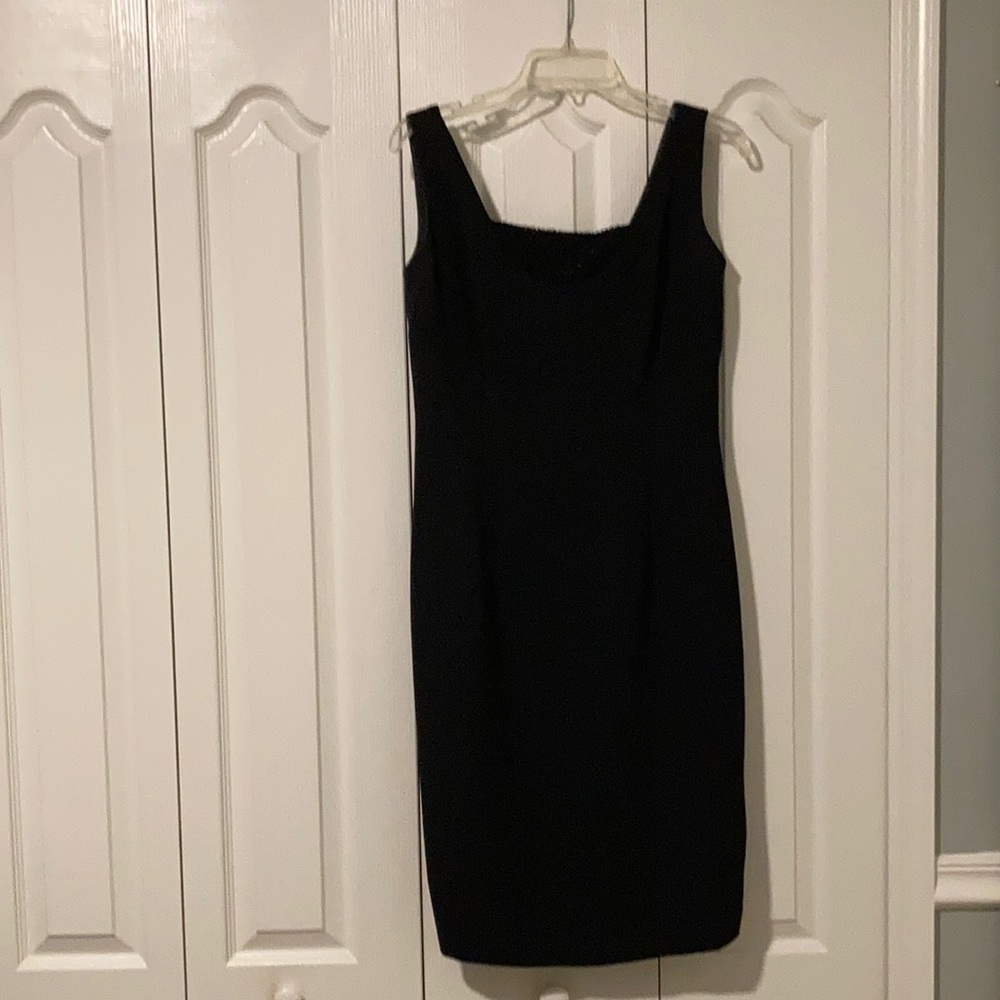 Maggy London size 12 black knee length cocktail dress.